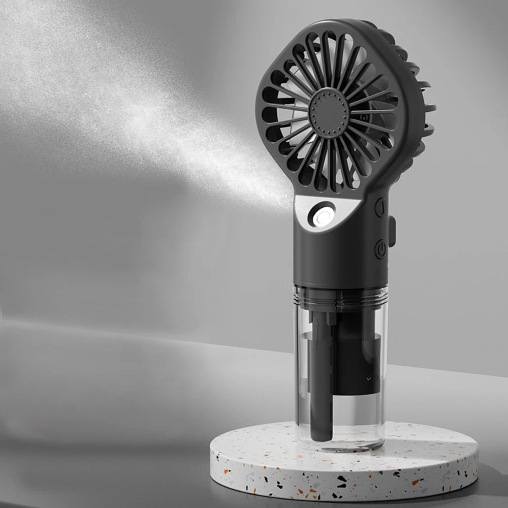 Portable Mini Handheld Mist Fan – USB Rechargeable 4-Speed Cooling & Humidifier Fan for Travel, Office & Outdoor Use